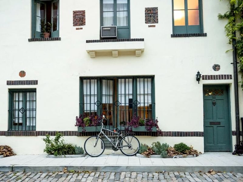 Neatly detailed window and door reveals on an insulated house facade